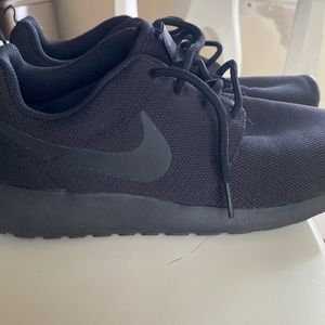 Women’s all black Nike sneakers never worn size 8. No box.
